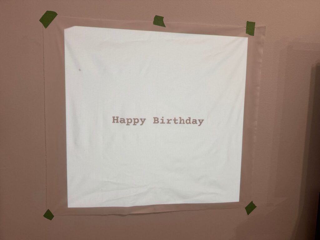 projector of the hand-painted linen sign