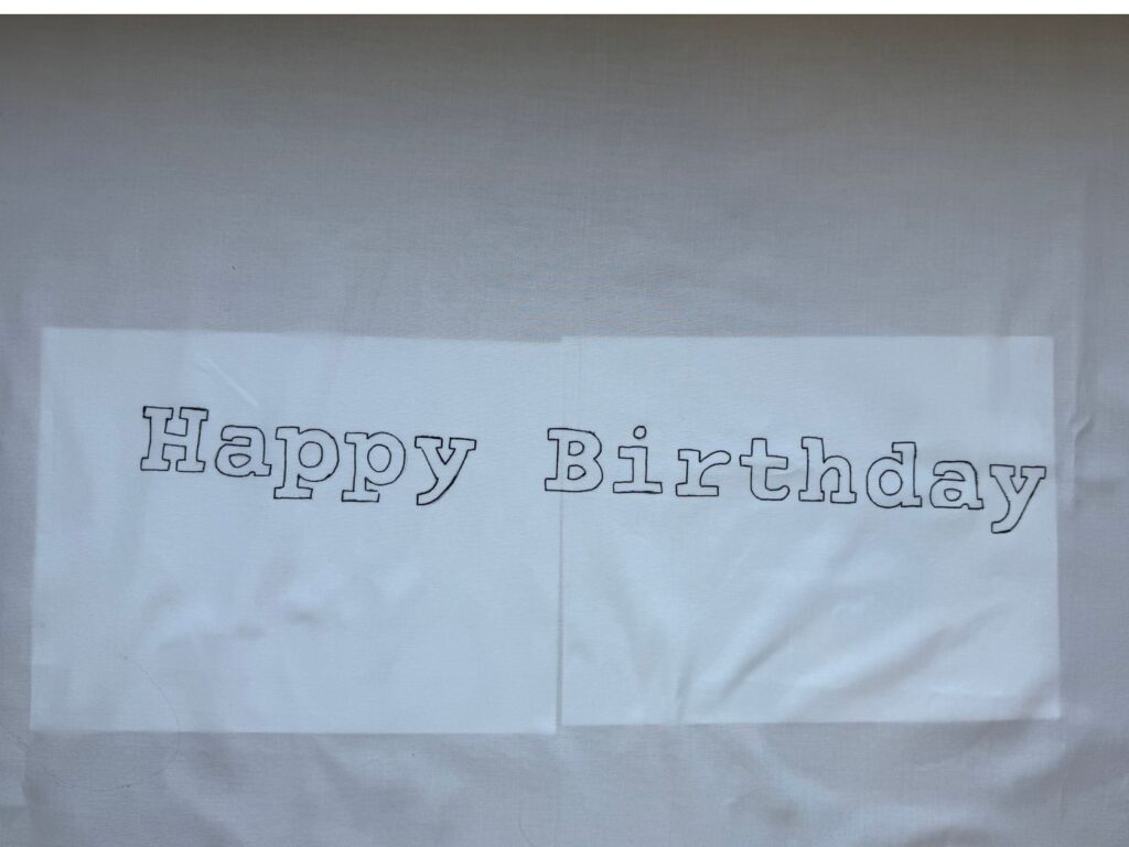 painted outline of the hand-painted linen sign